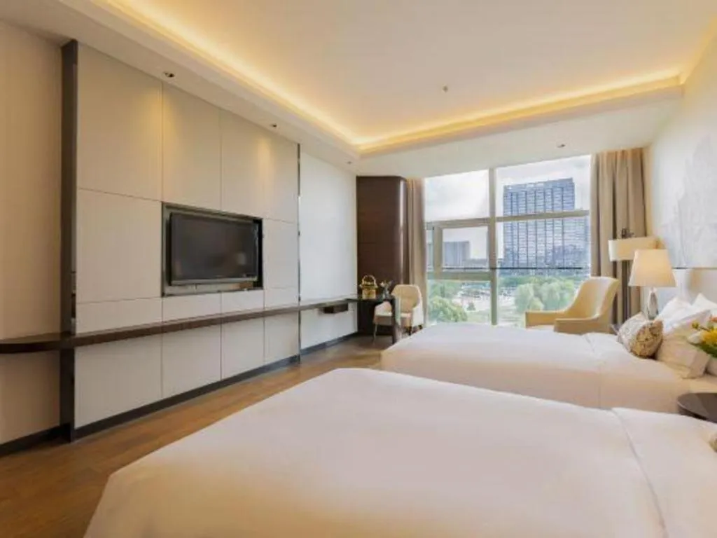 Bed in Nanjing Lakehome Hotels and Resorts