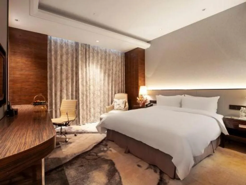 Bed in Nanjing Lakehome Hotels and Resorts
