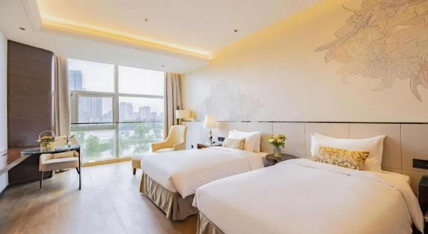 Bed in Nanjing Lakehome Hotels and Resorts