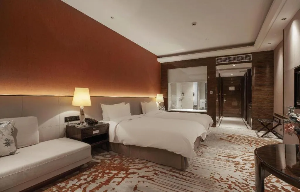 Bed in Nanjing Lakehome Hotels and Resorts