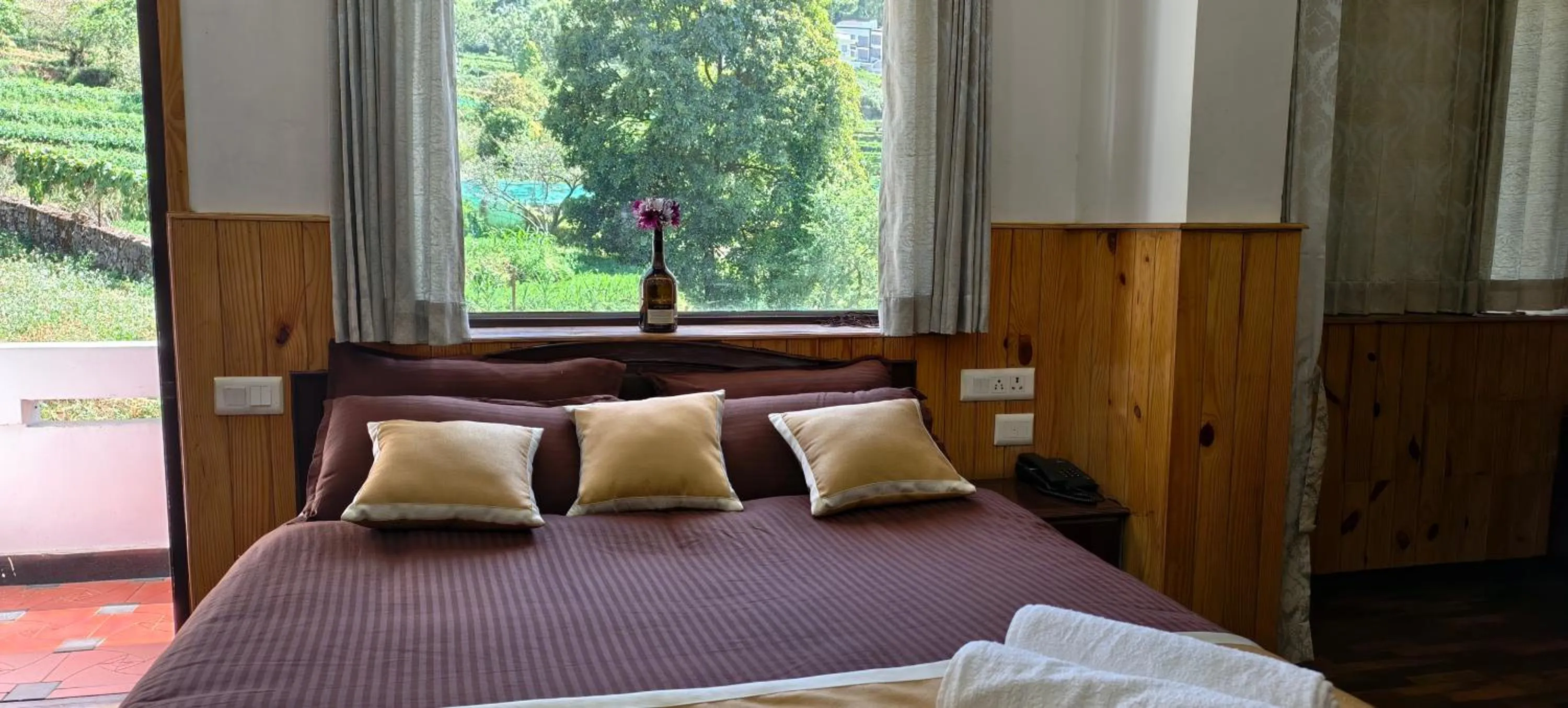 Bed in Tree Elanza, Unit of Santhi Ayurvedic Resort