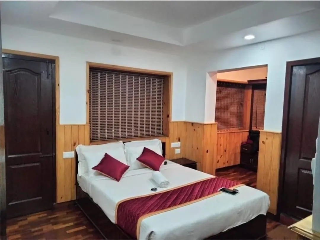 Bed in Tree Elanza, Unit of Santhi Ayurvedic Resort