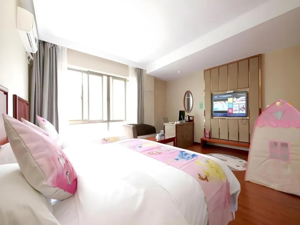 Bed in GreenTree Inn ChiZhou QinGYAng Miaoqian Road Rongxing Building Business Hotel