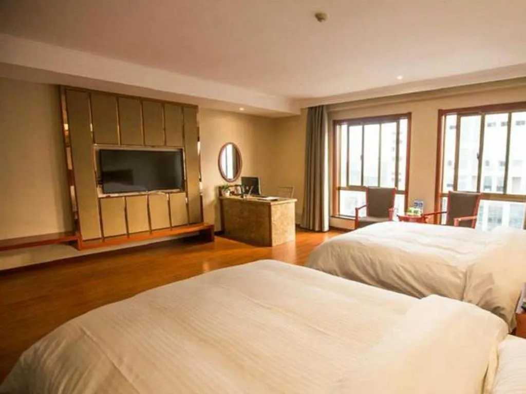 Bed in GreenTree Inn ChiZhou QinGYAng Miaoqian Road Rongxing Building Business Hotel