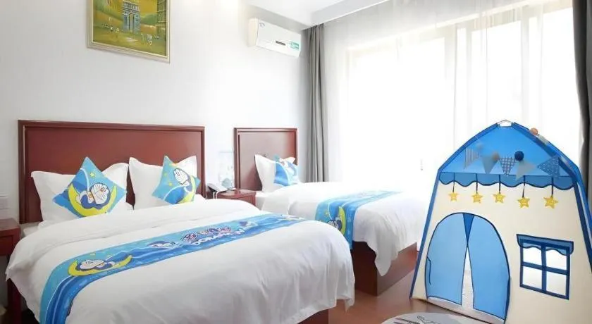 Bed in GreenTree Inn ChiZhou QinGYAng Miaoqian Road Rongxing Building Business Hotel