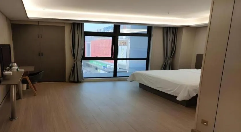 Bed in GreenTree Inn ChaoHu Tianchao Plaza Express Hotel