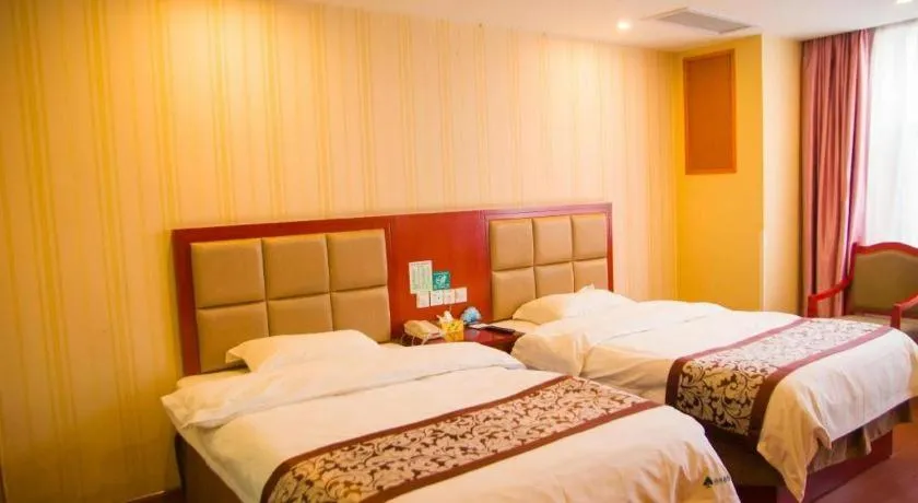 Bed in GreenTree Inn Chuzhou City Quanjiao County High-Speed Italy Trade City Business Hotel