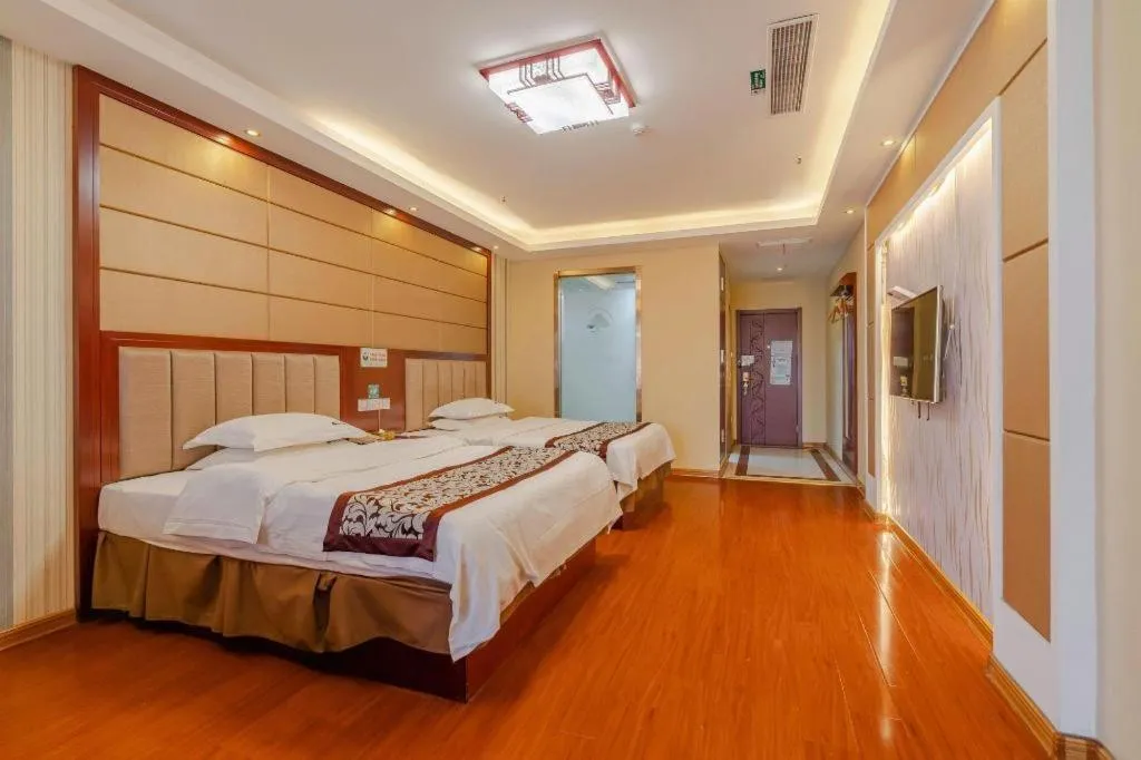 Bed in GreenTree Inn Chuzhou City Quanjiao County High-Speed Italy Trade City Business Hotel