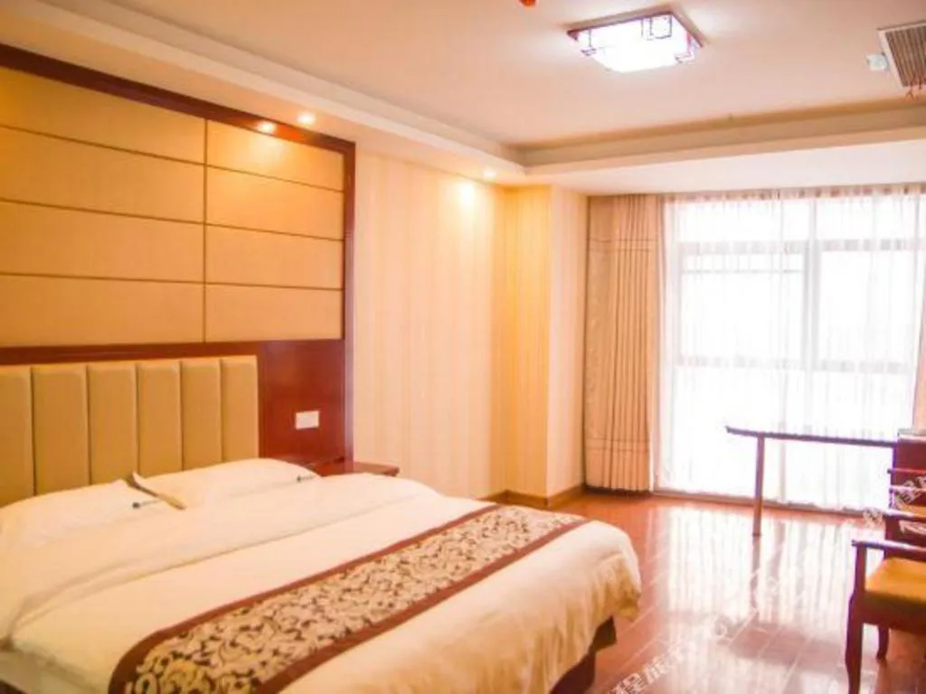 Bed in GreenTree Inn Chuzhou City Quanjiao County High-Speed Italy Trade City Business Hotel