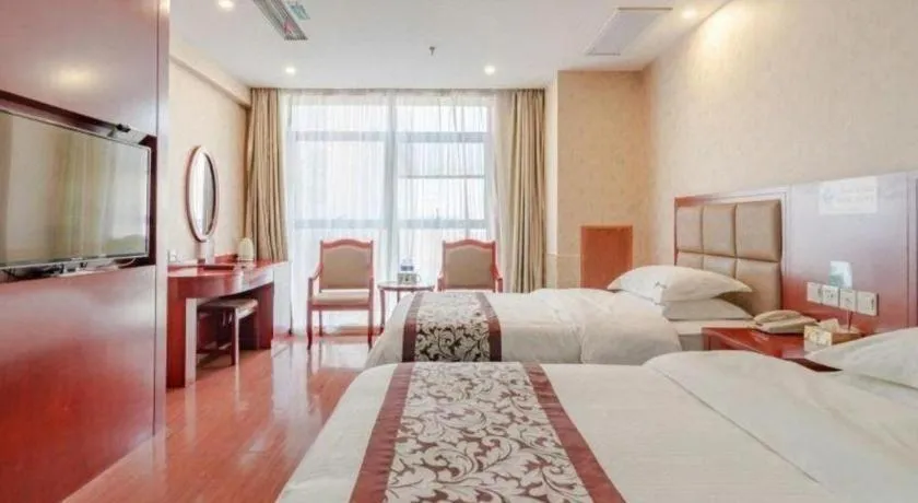 Bed in GreenTree Inn Chuzhou City Quanjiao County High-Speed Italy Trade City Business Hotel