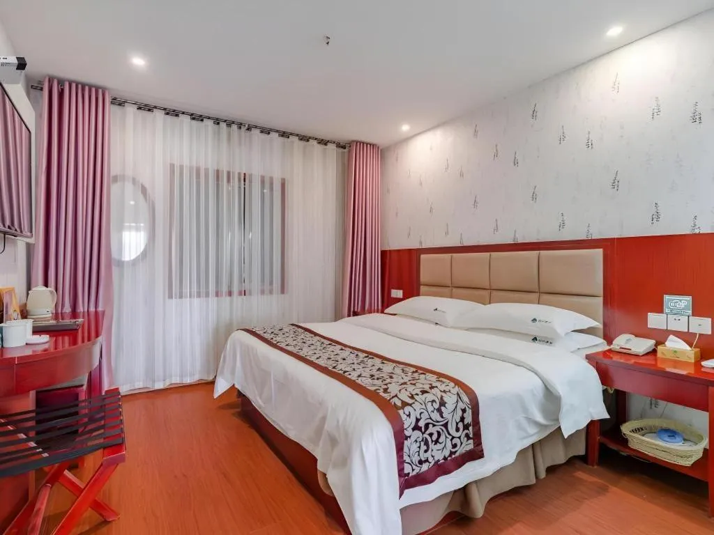 Bed in GreenTree Inn Chuzhou City Quanjiao County High-Speed Italy Trade City Business Hotel