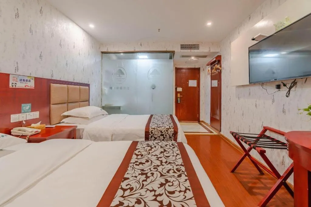 Bed in GreenTree Inn Chuzhou City Quanjiao County High-Speed Italy Trade City Business Hotel