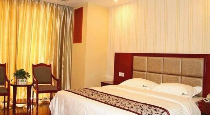 Bed in GreenTree Inn Chuzhou City Quanjiao County High-Speed Italy Trade City Business Hotel