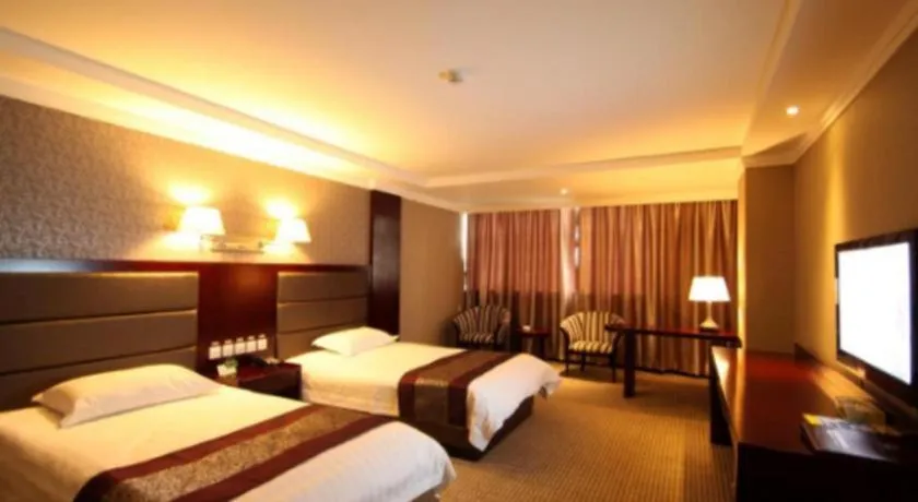 Bed in GreenTree Inn Chuzhou City Quanjiao County High-Speed Italy Trade City Business Hotel