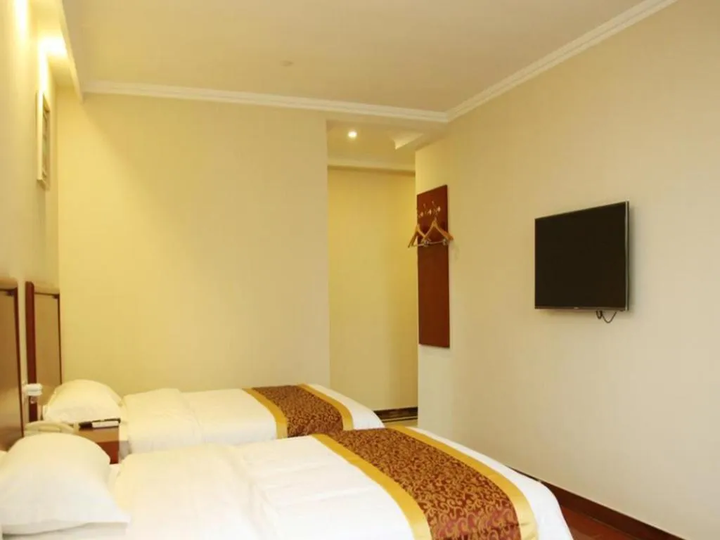 Bed in GreenTree Inn Chuzhou City Quanjiao County High-Speed Italy Trade City Business Hotel