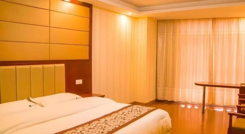 Bed in GreenTree Inn Chuzhou City Quanjiao County High-Speed Italy Trade City Business Hotel