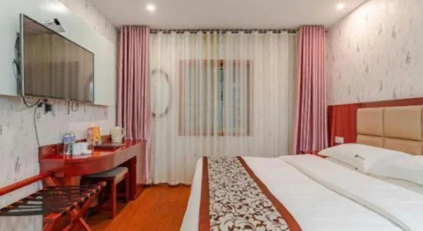 Bed in GreenTree Inn Chuzhou City Quanjiao County High-Speed Italy Trade City Business Hotel