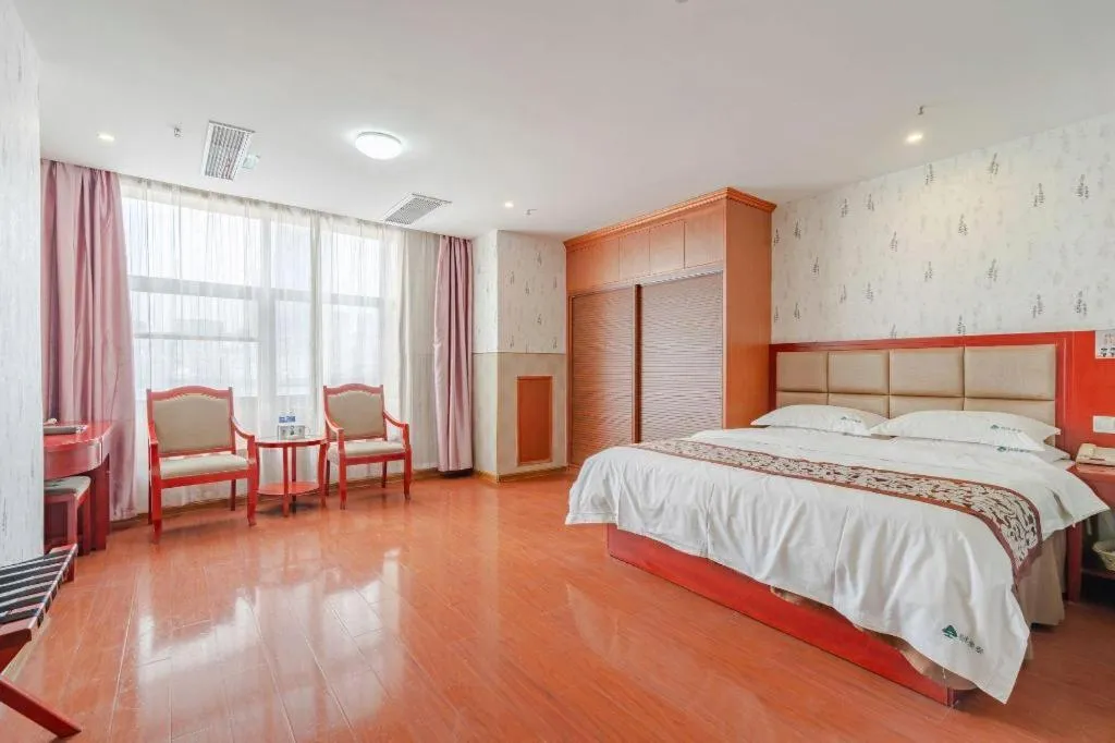 Bed in GreenTree Inn Chuzhou City Quanjiao County High-Speed Italy Trade City Business Hotel