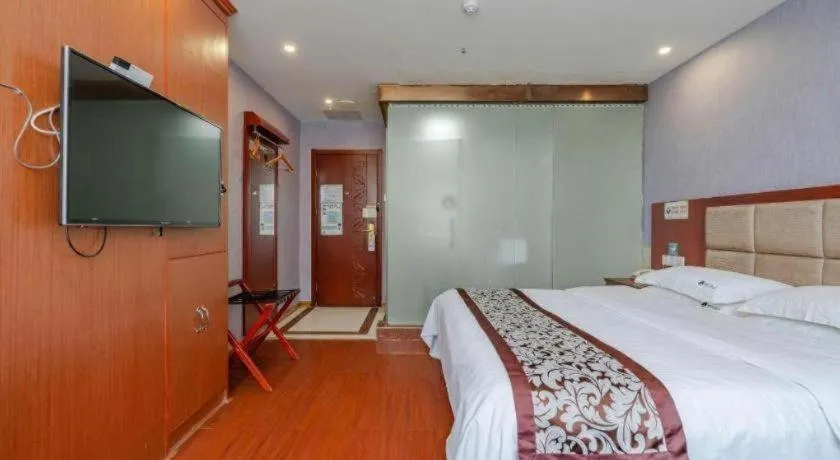 Bed in GreenTree Inn Chuzhou City Quanjiao County High-Speed Italy Trade City Business Hotel