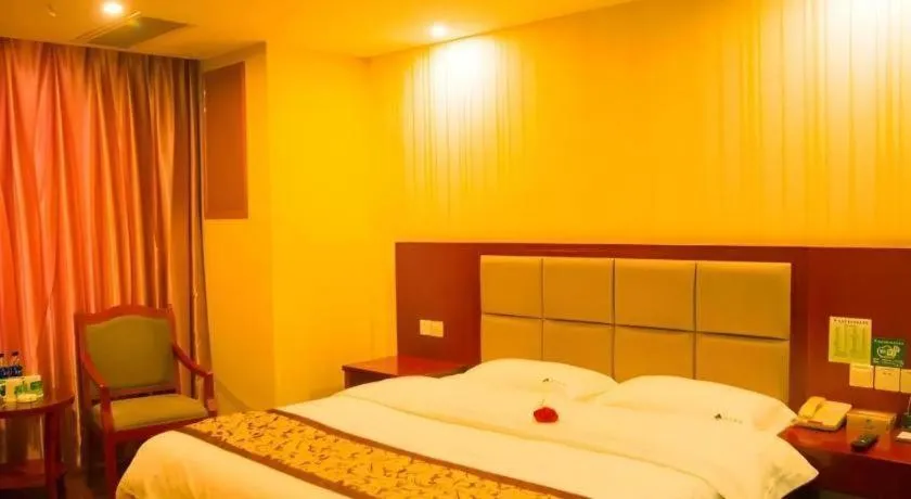 Bed in GreenTree Inn Chuzhou City Quanjiao County High-Speed Italy Trade City Business Hotel