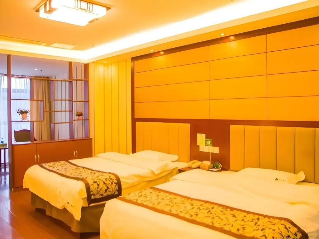 Bed in GreenTree Inn Chuzhou City Quanjiao County High-Speed Italy Trade City Business Hotel