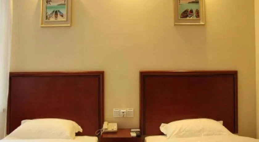 Bed in GreenTree Inn Chuzhou City Quanjiao County High-Speed Italy Trade City Business Hotel