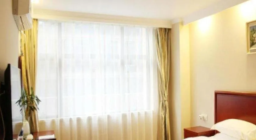 Bed in GreenTree Inn Chuzhou City Quanjiao County High-Speed Italy Trade City Business Hotel