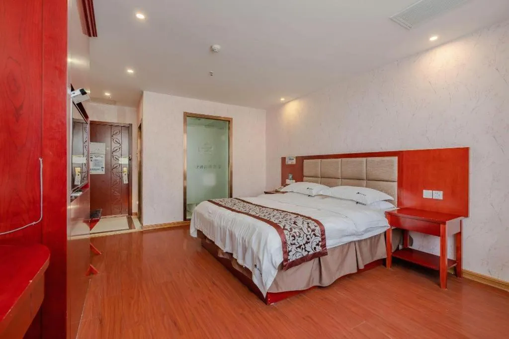 Bed in GreenTree Inn Chuzhou City Quanjiao County High-Speed Italy Trade City Business Hotel