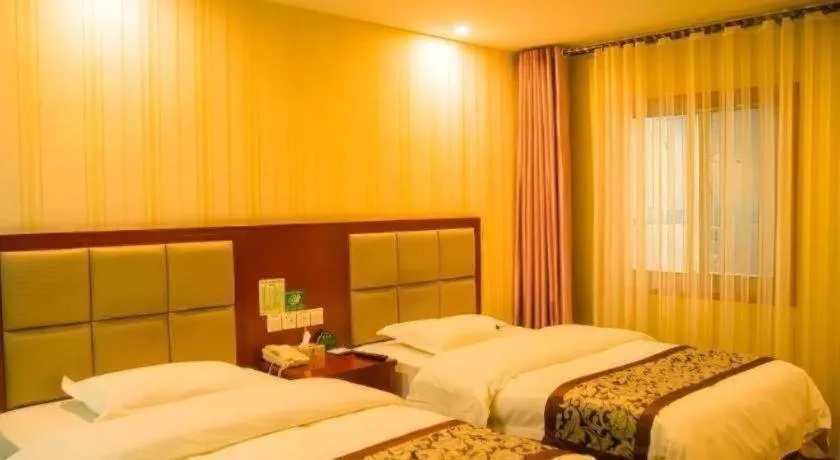 Bed in GreenTree Inn Chuzhou City Quanjiao County High-Speed Italy Trade City Business Hotel