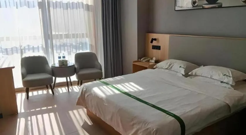 Bed in GreenTree Inn Chuzhou City Quanjiao County High-Speed Italy Trade City Business Hotel