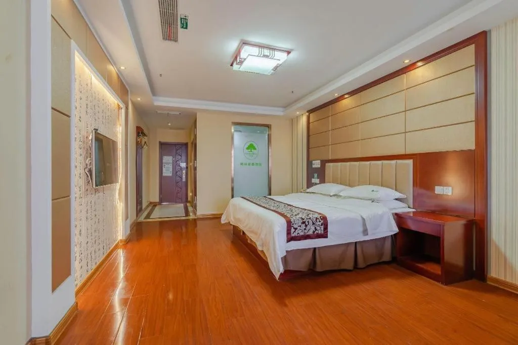 Bed in GreenTree Inn Chuzhou City Quanjiao County High-Speed Italy Trade City Business Hotel