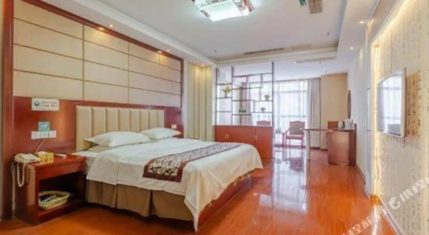 Bed in GreenTree Inn Chuzhou City Quanjiao County High-Speed Italy Trade City Business Hotel