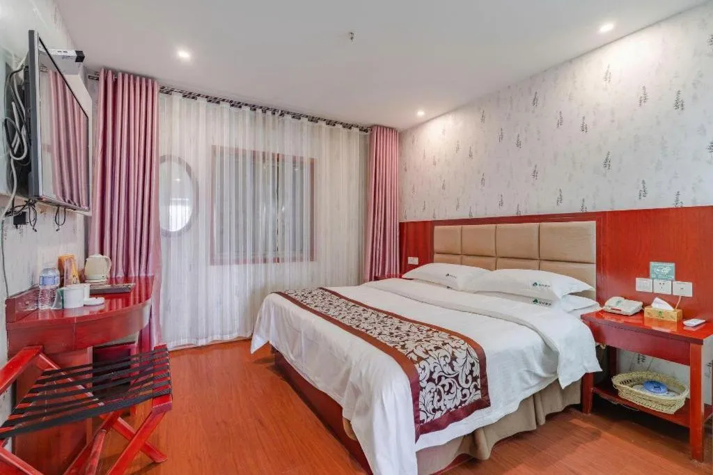 Bed in GreenTree Inn Chuzhou City Quanjiao County High-Speed Italy Trade City Business Hotel