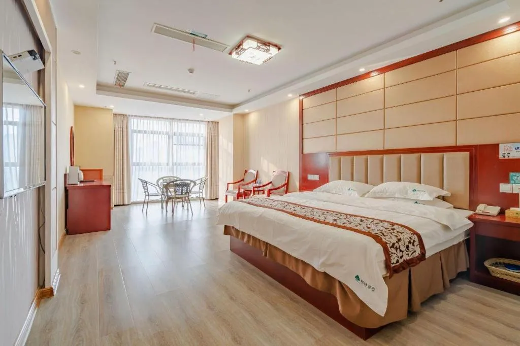 Bed in GreenTree Inn Chuzhou City Quanjiao County High-Speed Italy Trade City Business Hotel