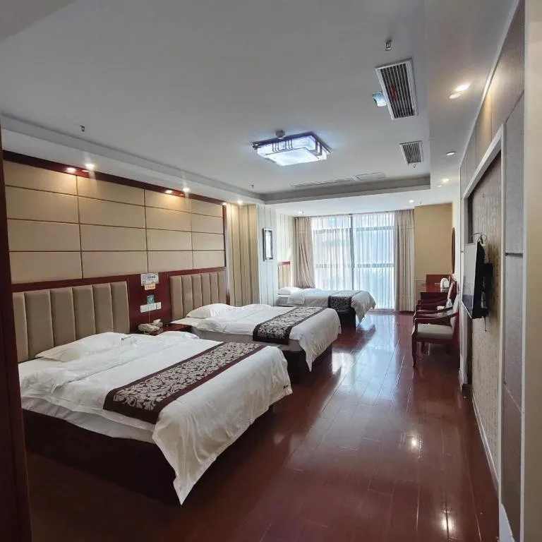 Bed in GreenTree Inn Chuzhou City Quanjiao County High-Speed Italy Trade City Business Hotel