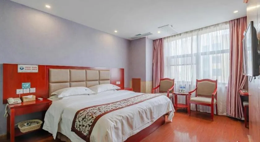 Bed in GreenTree Inn Chuzhou City Quanjiao County High-Speed Italy Trade City Business Hotel