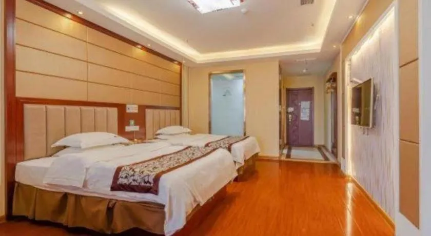 Bed in GreenTree Inn Chuzhou City Quanjiao County High-Speed Italy Trade City Business Hotel