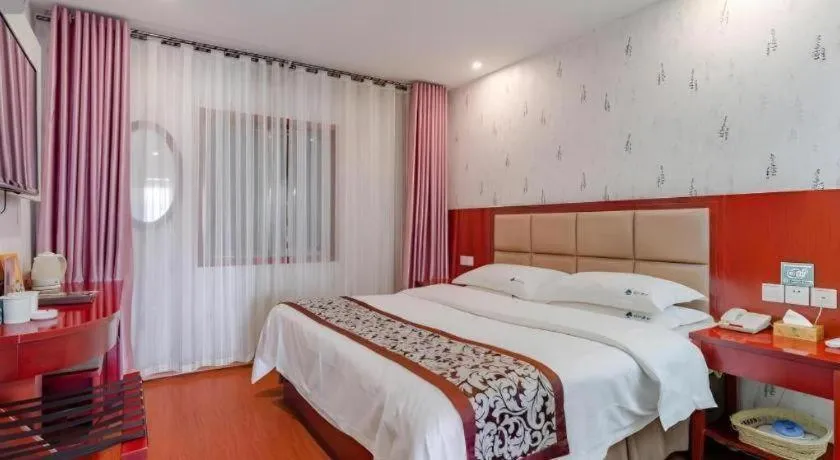 Bed in GreenTree Inn Chuzhou City Quanjiao County High-Speed Italy Trade City Business Hotel