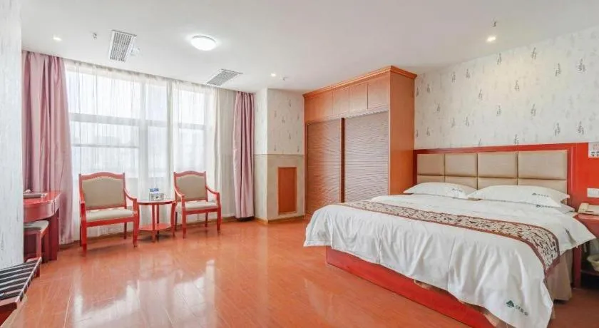 Bed in GreenTree Inn Chuzhou City Quanjiao County High-Speed Italy Trade City Business Hotel