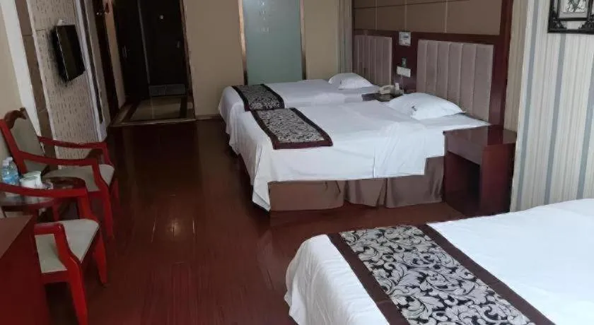 Bed in GreenTree Inn Chuzhou City Quanjiao County High-Speed Italy Trade City Business Hotel
