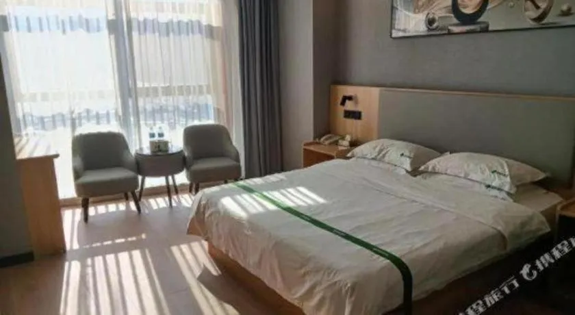 Bed in GreenTree Inn Chuzhou City Quanjiao County High-Speed Italy Trade City Business Hotel