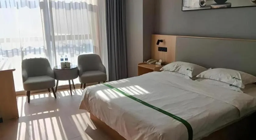 Bed in GreenTree Inn Chuzhou City Quanjiao County High-Speed Italy Trade City Business Hotel