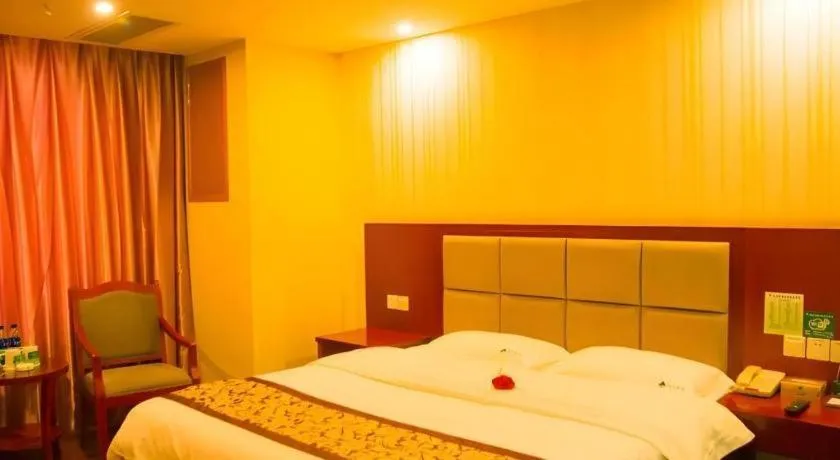 Bed in GreenTree Inn Chuzhou City Quanjiao County High-Speed Italy Trade City Business Hotel