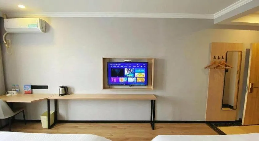 Bed in GreenTree Inn Taizhou New District Hospital of Renmin Hospital Mingliu Express Hotel