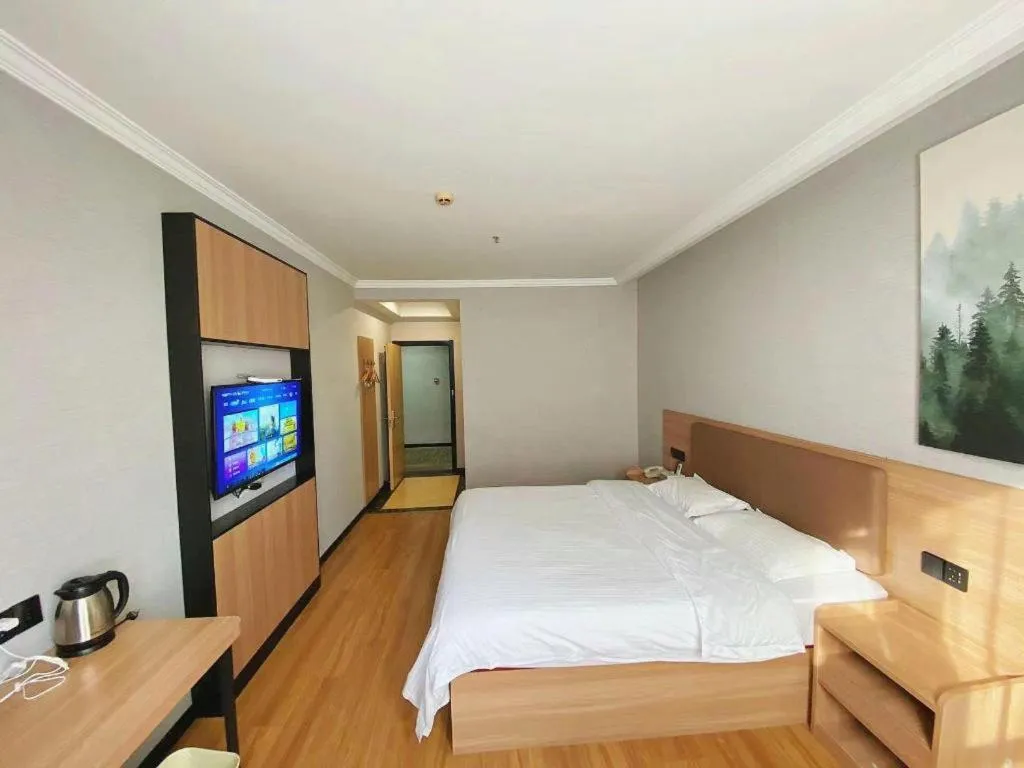 Bed in GreenTree Inn Taizhou New District Hospital of Renmin Hospital Mingliu Express Hotel