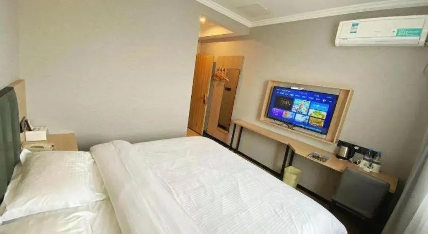 Bed in GreenTree Inn Taizhou New District Hospital of Renmin Hospital Mingliu Express Hotel