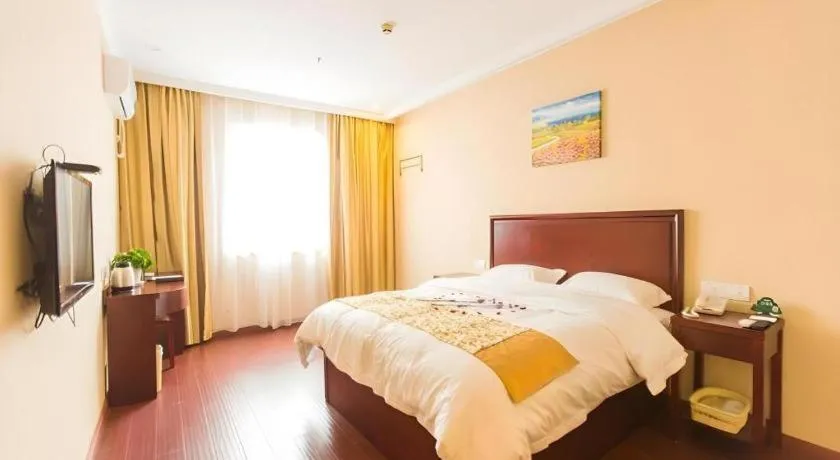 Bed in GreenTree Inn Taizhou New District Hospital of Renmin Hospital Mingliu Express Hotel