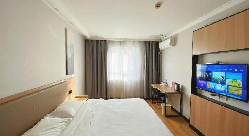 Bed in GreenTree Inn Taizhou New District Hospital of Renmin Hospital Mingliu Express Hotel