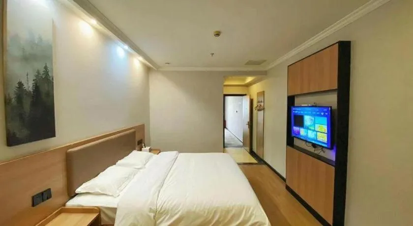 Bed in GreenTree Inn Taizhou New District Hospital of Renmin Hospital Mingliu Express Hotel