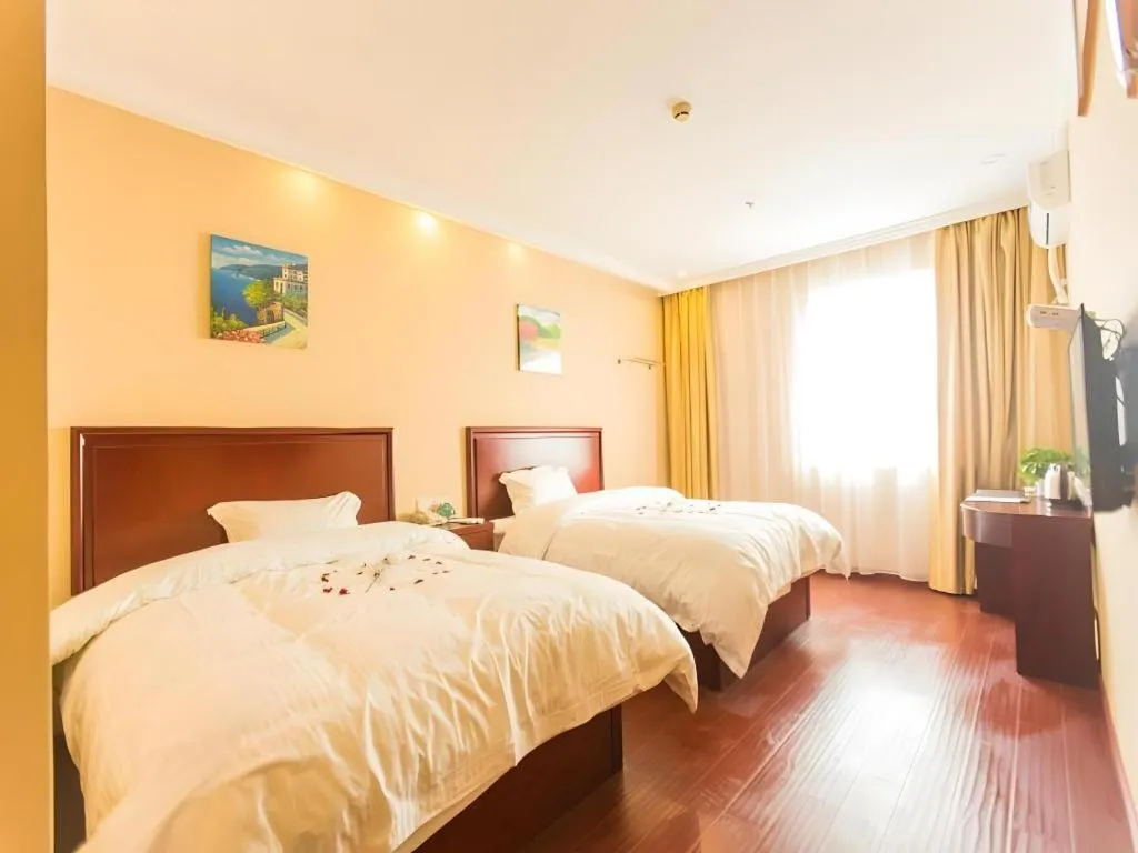 Bed in GreenTree Inn Taizhou New District Hospital of Renmin Hospital Mingliu Express Hotel